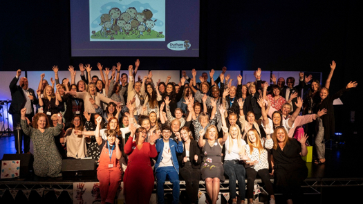Durham council children's services staff celebrate their improved Ofsted rating