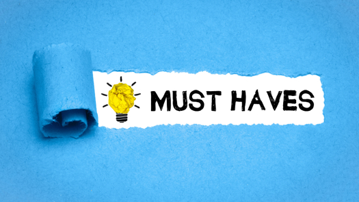 The words 'must haves' against a blue background 
